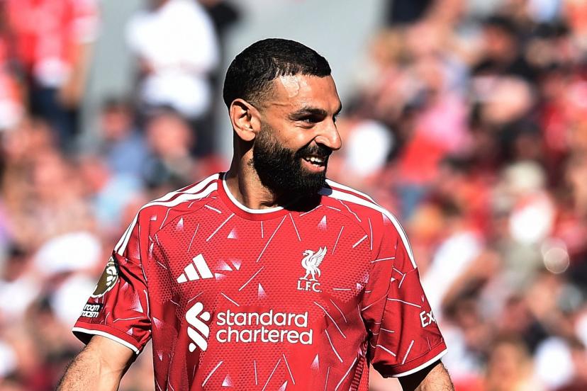 Mohamed Salah célébrant une passe décisive pour Liverpool contre Brentford